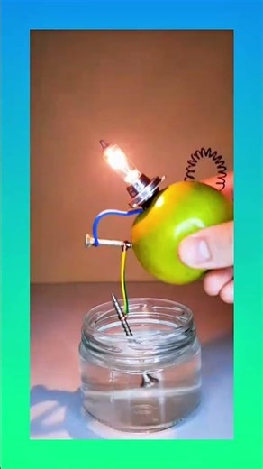 Science or magic? Lighting up a bulb using an apple and water. A fun experiment. #ScienceExperiment