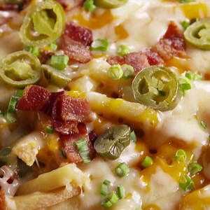 Loaded Cheese Fries are basically nachos, but better. Full recipe: http://dlsh.it/ANCw1FB | Delish
