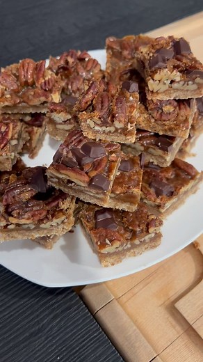 Andrew Zimmern on Instagram: "Aunt Suzanne’s Caramel Pecan Bars from my website. 5 ingredients and so so easy. Happy Holidays to all"