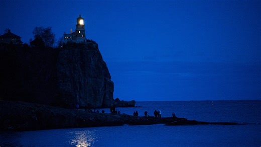 Split Rock Lighthouse lights its beacon to honor the Edmund Fitzgerald and its crew