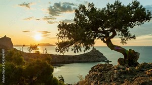 Russia, Crimea. Time-lapse photography, dawn at Cape Kapchik, Novyi Svet village. The city of Sudak, the Black Sea.