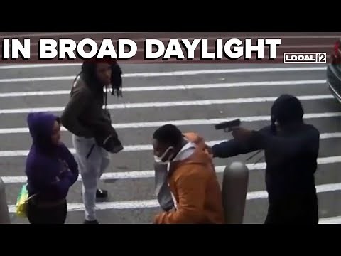 Suspect charged in murder of man in crowded Walmart parking lot