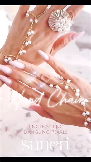 Suneri on Instagram: "Elevate your brown girl style with our Pearl Handchains featuring delicate dangling pearls. DM to order our Single String Pearl Hand Chains #handchain #haathphool #pearlbracelets #braceletoftheday #indianjewelry"