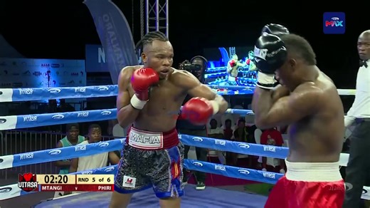 Wilson Phiri (red trunks) kuswana ndi Richard Mtangi (black and blue trunks) Video credit: Azam sports #malawiboxingnews2025 | Malawi Boxing News