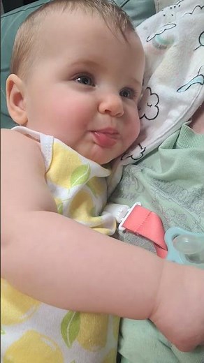 Happy hiccuping baby blows raspberries. 6-19-24