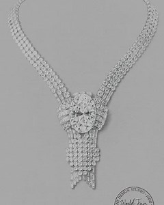 Taking over two years to craft by hand, our artisans brought the reimagined World’s Fair necklace and transformable ring to life with over 100 total carats of diamonds. #TiffanyHighJewelry #TiffanyAndCo Learn more: https://bit.ly/3JWtSrY | Tiffany & Co.