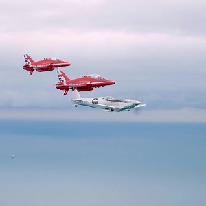 15K views · 1.7K reactions | You know you’ve achieved something significantly special when the @rafredarrows come out to escort you home!  #spitfiresdotcom #spitfire #supermarinespitfire #silverspitfire #girty #thelongestflight #return #anniversary #warbird #history #guinessworldrecord #aroundtheworld #famous #wwii #aircraft #planesofinstagram #ww2planes #secondworldwar #combat #veteran #glory #freedom #flying #redarrows #hawk #jet #whitecliffs | Spitfires.com | Facebook