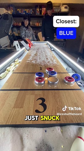 Intense Shuffleboard Battle: Closest to the Pin Wins