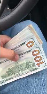 Counting A lot of Hundred dollar bills. That motion picture money