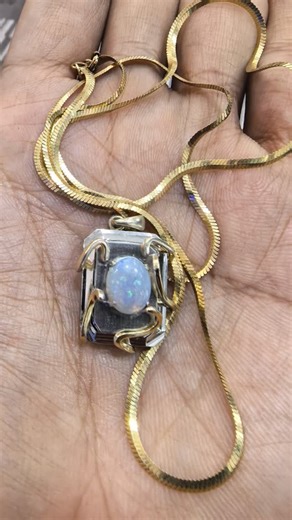 Tristan de Mortel on Instagram: "Adding to my collection is a cufflink turned into pendant with a gorgeous Australian White Opal in colorful flashes 😉😎 #collection #gemstones #opal #jewelry #trending"