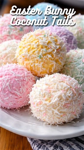 Sweet, chewy, and bursting with pastel Easter vibes, these no-bake coconut bites are creamy on the inside and perfectly fluffy on the outside. 📝 Ingredients: 1 can (14 oz) sweetened condensed milk 1 tsp vanilla extract 4 cups shredded sweetened coconut (plus 1 cup extra for rolling) Gel food coloring (pastel pink, yellow, blue, green, purple) 🍽️ How to Make It: 1. Prepare the Base: In a large mixing bowl, stir together the sweetened condensed milk and vanilla extract until smooth and creamy. 2