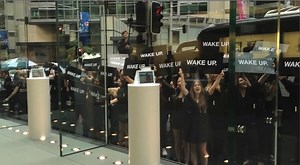 Flashmob at Sydney Apple Store tells customers and staff to 'Wake Up'