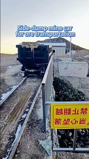 Side-tipping mine cars for transporting ore