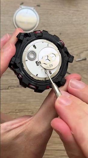 How to change the battery in a Skmey watch?