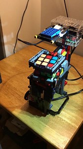 Lego-built machine solves Rubik's Cube