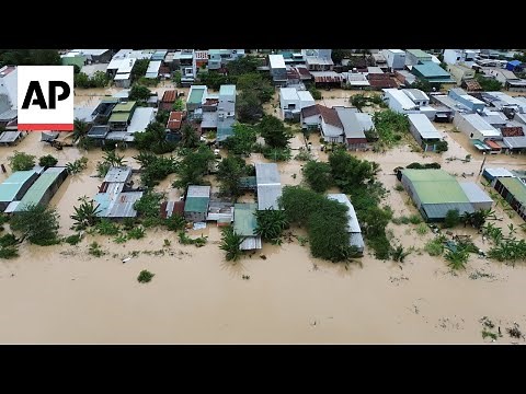 Vietnam begins clean up after worst flooding in decades which left dozens dead
