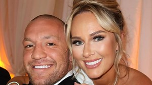 Conor McGregor poses with Dee Devlin and kids at sister Erin's glamorous wedding