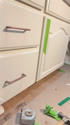 Installing pulls on freshly painted cabinets!#drawers #doors#copper #bathroom