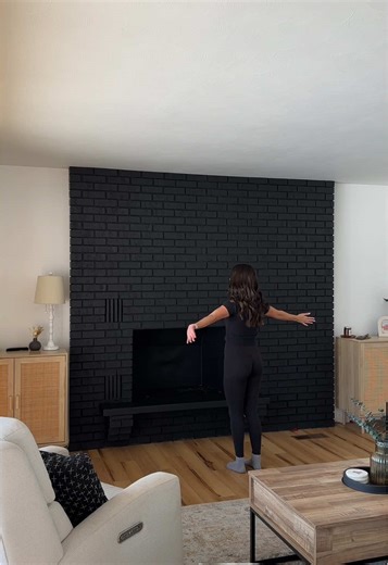 Transforming a Brick Fireplace with Black Paint