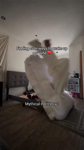 Memes® on Instagram: "This video is a fast-paced "mythical memes" compilation featuring a series of humorous and chaotic clips set to a harmonious, multi-layered vocal track. It begins with a prank where a bed frame is suddenly tilted upward to "wake up" a sleeping woman, followed by a bowling mishap where a second ball is thrown while the sweeper is down. The montage continues with a street performer accidentally stepping on a person dressed as Superman, a massive wave crashing through an open 
