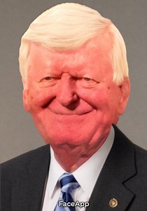 Faces of all Republican and Democrat US senators combined into two monstrous headshots