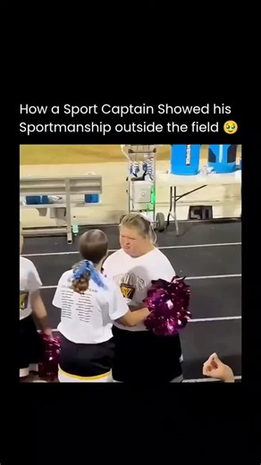 E History on Instagram: "Nobody wanted to take her to the homecoming dance, but the team captain stepped up and turned the night into something unforgettable. In front of the crowd, he walked up with flowers and a simple sign, not to seek attention, but to make sure his friend felt seen, valued, and included. Her smile, her hug, and the joy in that moment became the real highlight of the game. This wasn’t about popularity or a dance — it was about kindness, true friendship, and the kind of chara
