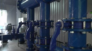 Water valves pipes system condensate equipment at the station of water supply and treatment smooth camera movement