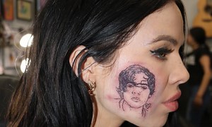 This Singer Tattooed Harry Styles’ Face on Her Own Face