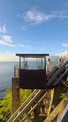 The journey to Rock Bar, Bali is just as breathtaking as the destination. Descend in style with our iconic inclinator, gliding down the dramatic cliffs with panoramic ocean views. This one-of-a-kind experience sets the stage for an unforgettable evening of sunsets, cocktails, and seaside luxury. 🌅🍸 Indulge in exclusive Rock Bar privileges, including priority seating, when you stay at AYANA Bali. Enjoy up to 20% off your room rate with our special booking code: IGAYANA. #AYANABali #RockBarBali 