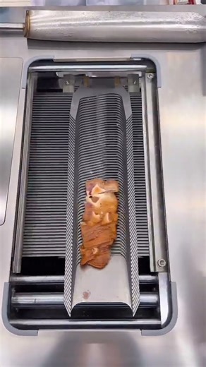 A slanted fish fillet machine can handle all the fresh fish and pig ears!