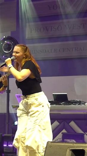 Ellie Banke sang her original song “Tenacity” at her old high school’s homecoming assembly. | Next Vocal Star