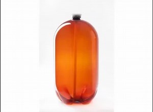 Exploring a Brown Glass Beer Bottle with Adorable Dog