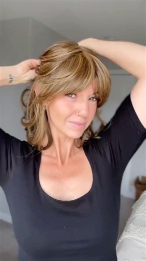 On the go, but make it chic. ✨ @chiquelhair is wearing On My Way in Honey Toast—and making it her own! Style the bangs heavy or wispy. We’ve left them long so your stylist can trim to the desired length. Raquel Welch Wigs #ravesforraquel | Raquel Welch Wigs