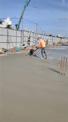 How Contractors Smooth a Concrete Slab | Power Trowel Finish Process