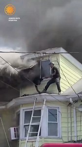 Dramatic video captured the moment a Pennsylvania man rescued his neighbor from a burning building, as smoke billowed out the windows. | CBS Mornings