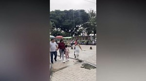 Wife caught cheating chases husband in bedsheet through streets begging forgiveness