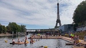 Historic Plunge: Parisians and Tourists Celebrate First Swim in the Seine in Over 100 Years