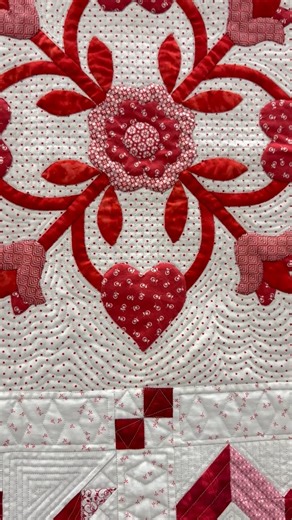 Take a closer look at the beautiful fabrics shared in "Neighborly Swap," created by Becky Mathison of Noblesville, Indiana, and quilted by Carlene Clark. "My backyard neighbor, Judy Purgason, and I got together and shared all the red and white fabrics from our stashes — plus, buying a few more! We cut out two of every block so that each of us would end up with a completed quilt top," Becky said in her artist statement. "Neighborly Swap," created by Becky Mathison of Noblesville, Indiana, and qui