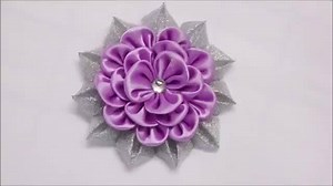 22K views · 1.4K reactions | Watch the video to learn how to create a Kanzashi Flower made of ribbon. What do you think? ;-) | Pretty flowers | Facebook