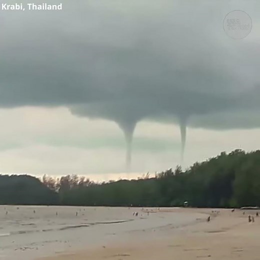 Rare double waterspout tornado appears in sky | USA TODAY