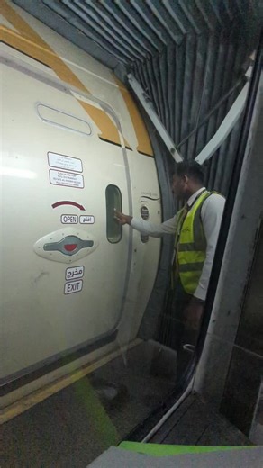 Train Conductor Demonstrates Door Opening Process