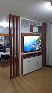 Divider with rotating TV #furnitureonline #furnituredesign #interiordecorating #InteriorDesign #interiordesigner #homedesign #creativedesign #HomeImprovement #tvrack #RotatingTV | Creative Design