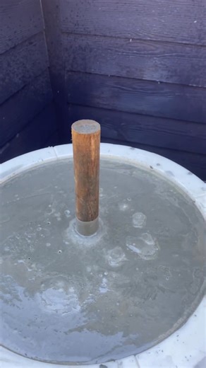 Concrete de bubbler table getting the air out. | Matt Johnson