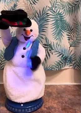 Gemmy spinning snowflake snowman (2 song)