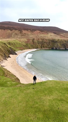 Silver Strand — Wild, Quiet, Unreal Silver Strand is a hidden, horseshoe-shaped beach in Donegal, framed by high cliffs and soft, pale sand. What makes it special is how sheltered it feels from the Atlantic, while still keeping its wild, untouched character. 🌊 #donegal #silverstrandbeach #ireland #travel #fyp | Infinity Exploring
