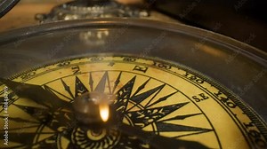 Closer look of the moving arrows of the compass on top of the navigational map inside the room