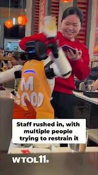 Dancing robot at hotpot restaurant knocks items off table mid-performance