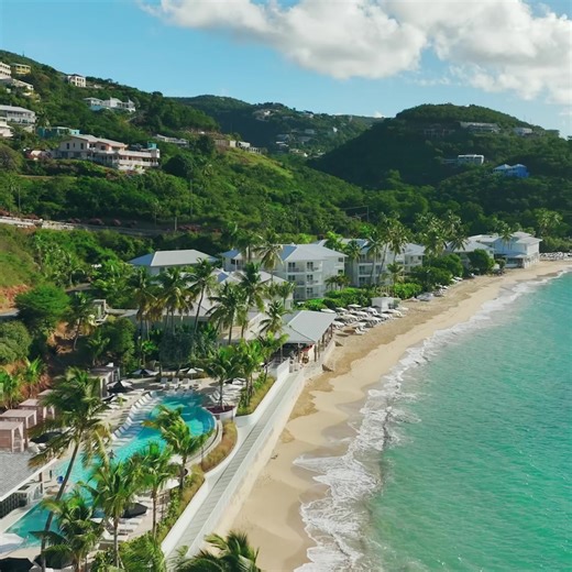 Experience barefoot luxury at Buoy Haus Beach Resort St. Thomas, where tropical breezes and vibrant island life meet stylish comfort just steps from the sand. With stunning ocean views, beach-side lounges, and a lively yet relaxed vibe, this Caribbean getaway feels effortless. | Buoy Haus, Autograph Collection at Frenchman's Reef