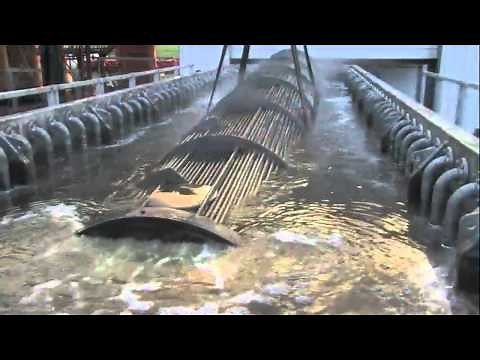 Ultrasonic cleaning of heat exchangers