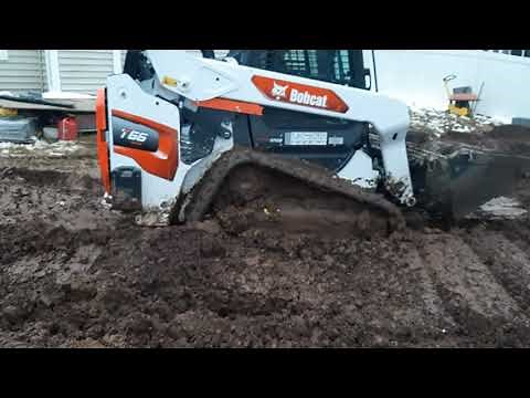 Bobcat T66 Working in Deep Mud